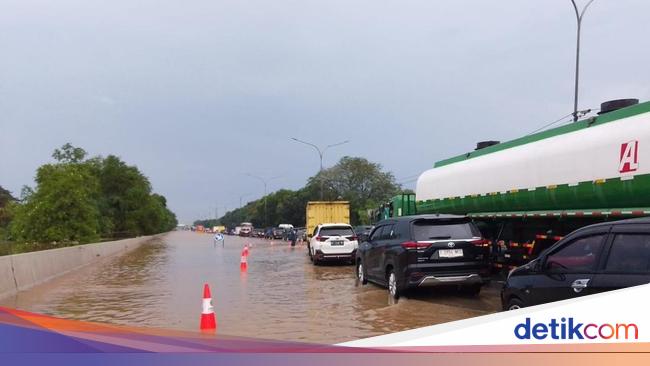 Genangan Air di KM 24 Tol Jakarta-Tangerang, Lalin Macet Malam Ini